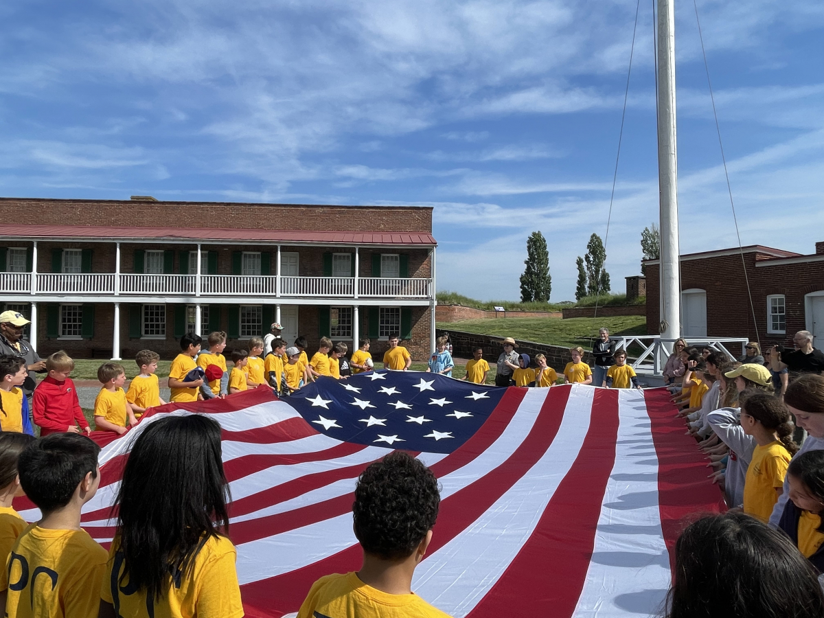 The "Star-Spangled Banner" about to be raised above Fort McHenry